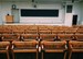 row of chairs in a school auditorium